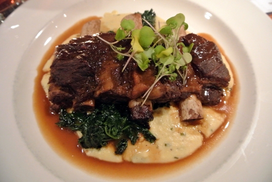 Bison short ribs -- braised in red wine and served on a creamy herbed polenta, garlic sautéed greens & jus...$25 